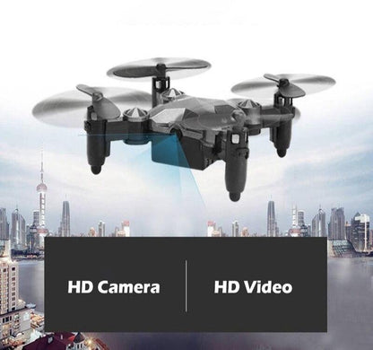 Compact X-Layout Drone with Wrist-Mounted Controller