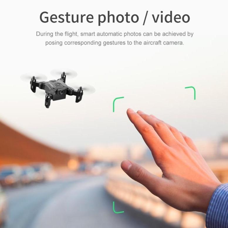 Compact X-Layout Drone with Wrist-Mounted Controller
